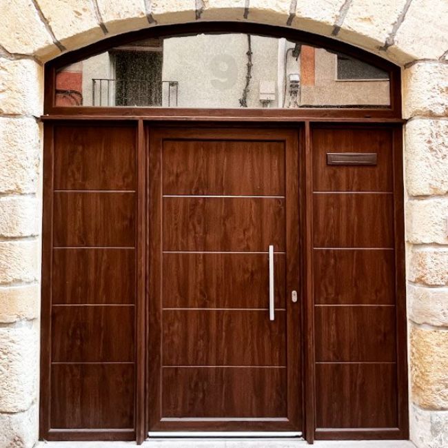 Portes d'alumini i PVC a Ripollet amb FA&MA